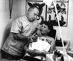 Portraits of a painted lady: Stunning vintage photos reveal the 'tramp  stamp' is not so modern phenomenon after all