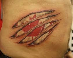 Canadian Flag Under Skin Rip Tattoo Rip Tattoo Ripped Skin Tattoo Tattoos