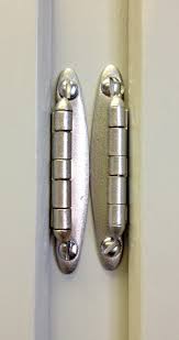 Once the primer dries, follow with a coat of paint and install the new hardware. More Spray Paint Magic This Time On Hinges The Impatient Gardener