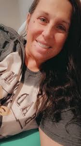 Introduction of a new member in a lesbian community from New York