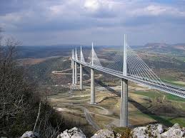 Paris To Barcelona Highway There Is Something Just Not Right About Driving Above The Clouds The Millau Viaduct Is Par Beautiful Roads Millau Amazing Buildings