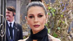 Catherine Zeta-Jones, 55, is the most Morticia Addams we've seen in extreme  plunging dress