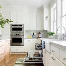 With their golden color, light maple cabinets can instantly warm and brighten any kitchen. Light Brown Cabinets With White Quartz Countertops Design Ideas