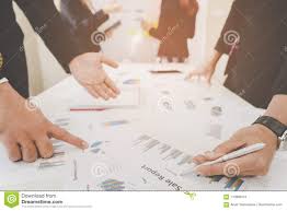Closed Up On Hand And Chart In Corporate Meeting Stock Image