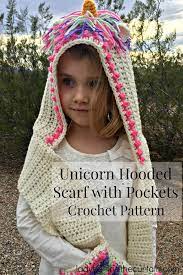 Girls knit unicorn cloak hat scarf. Unicorn Hooded Scarf With Pockets Crochet Pattern