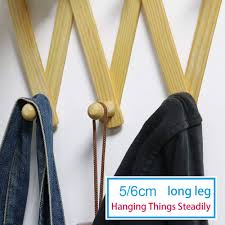 En bois, d'acacia, en métal, ou en chêne, nous vous proposons une large gamme de portes manteaux et portes manteaux muraux. Porte Manteau En Bois Naturel Accordeon Extensible Crochet De Placard Porte Manteau Pliable 10 Crochets Aliexpress