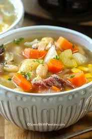 Slow Cooker Ham Bone Soup Is The Perfect Way To Use Up Your Leftover Holiday Ham It Is Slow Cooked With D Slow Cooker Soup Ham Bone Soup Ham Bone Soup