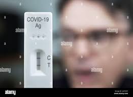 Covid 19 self test rapid antigen test hi-res stock photography and images