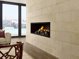 This Devastatingly Clean Modern Limestone Fireplace Acts As The Centre Piece In This Ultra Limestone Wall Interior Limestone Wall Cladding Limestone Cladding
