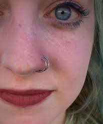 healed double nostril piercings switched out to a pair of anatometal niobium seam rings nose piercing double nostril piercing earings piercings