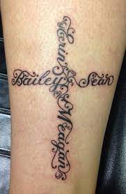 This Tattoo Combines The Popular Symbolism Of A Cross And A Highly Intricate And Symmetric Design Name Tattoos For Moms Tattoos For Daughters Tattoos For Kids