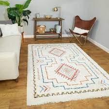 Traditionally, moroccan berber rugs have been woven by tribal peoples for their utility rather than a vintage moroccan rug can last for a very long time. Mistana Teen Carly Tribal Moroccan Shag Red Blue Off White Area Rug Reviews Wayfair