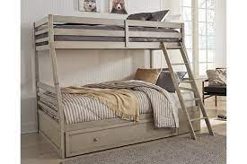 King sized bed, a dresser with a mirror and two nightstands. Lettner Twin Over Full Bunk Bed With 1 Large Storage Drawer Ashley Furniture Homestore