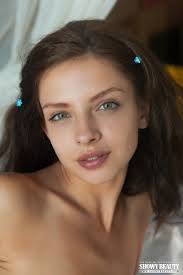 Green-eyed brunette teen spreading in bed at Brdteengal