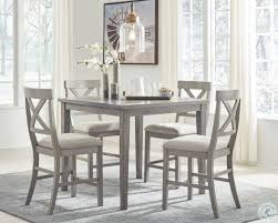 Set up your dining chairs around this kitchen table to enjoy family dinners. Parellen Gray Counter Height Dining Room Set From Ashley Coleman Furniture