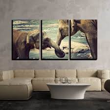 Decorate with homewares such as lamps, cushions and throws to add warmth. Amazon Com Wall26 Elephants Kissing Sri Lanka Canvas Art Wall Art 24 X36 X3 Panels Posters Prints