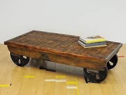 Living room sofa side table end desk coffee table with wheels & storage shelf. The Cast Iron Wheels Bear The Imprint Of Gh Webb Foundry In Bradford A Handsome And Well Proportioned Mill Truc Furniture Update Rustic Furniture Coffee Table