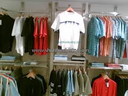 A wall garment rack provides a place to hang your shirts, coats and other clothing items to keep them orderly and within reach. Si Black Wall Mounted Garment Display Rack For Showroom Id 22269101830