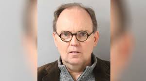 Ex-teacher charged with assaulting student