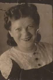 Genya Ewelson (cousin of my grandma) photographed in two pictures. One by  herself and the other with her first husband Leopold Reznik and his parents  Rachmiel and Riva Reznik, the third one