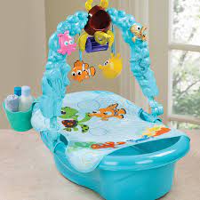 With so many different kids bath accessories available, it is simple enough to change the overall look simply by replacing a few key items like the shower curtain. This Is Such A Cute Baby Tub Baby Tub Nemo Baby Finding Nemo Baby