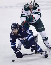 Winnipeg jets' mathieu perreault (85) celebrates after scoring against the ottawa senators during first period nhl hockey action in winnipeg, sunday, december 3, 2017. Joe Morrow Breaks Tie Jets Beat Wild 3 2 In Game 1 Taiwan News 2018 04 12 10 43 49