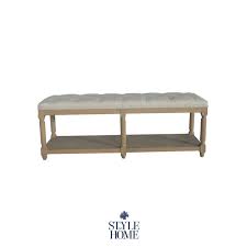 Neutral linen upholstery envelops the bench for an understated look, while cylindrical feet below sport a natural wood grain finish for a hint of warmth. Antoinette Linen Upholstered Oak Bench Seat Style My Home