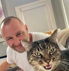 Grumpy cat's love for bacon and possessiveness