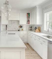 White Quartz Countertop White Shaker Kitchen Cabinets Marble C In 2020 Quartz Kitchen Countertops White Kitchen Remodel Countertops White Shaker Kitchen Cabinets