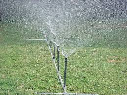 If you have spent thousands of dollars on landscaping, and live in an area of uncertain rainfall, you might consider installing an underground sprinkler system. Homemade Pvc Water Sprinkler Water Sprinkler Sprinkler System Diy Sprinkler Diy