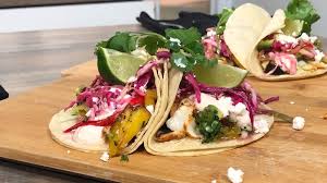 2 cups chopped white onion, divided, 3/4 cup chopped fresh cilantro, divided, 1/4 cup olive oil, 5 tablespoons fresh lime juice, divided, 3 tablespoons fresh orange juice, 2 garlic cloves, minced, 1 teaspoon dried oregano (preferably mexican), 1 pound tilapia, striped bass. Khai8zf6j1utjm