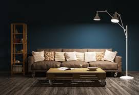 In a living room, you'll find a comfortable sofa and some chairs, as well as a. Spruce Up Your Living Room With Lighting Ideas Havells India Blog