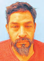 Pursuit, manhunt nets armed suspect