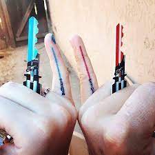 Discover the magic of the internet at imgur, a community powered entertainment destination. Star Wars Lightsaber Tattoos On Fingers