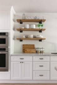 This shelving rack is perfect for any industrial, home, garage or kitchen use. Rustic Wood And Iron Kitchen Wall Shelves Transitional Kitchen