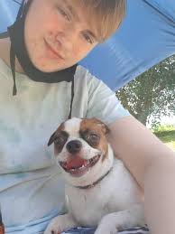 This is my male chi Little Bear. He is so very close to my youngest girl  (special needs) this was him protecting her after a seizure