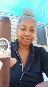 Finally got to this stick Oliva Black Swan that was in my swag bag from  CCW.. and I must say, " Thank You! " bcuz not only do I love swans.. I love  cigar bands that I can create something from it ( ...
