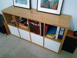 Oak Kallax Shelves From Ikea In The 4x2 Format Shelves Have Been Fitted With Four Cupboard Inserts Kallax Ikea Kallax Shelf Kallax Kids Room