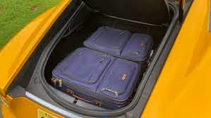 Trunk space in the f type coupe is decent but in cabin storage is minimal. 2021 Jaguar F Type Luggage Test Cargo Space Specs Photos