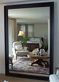 The uttermost gavorrano oversized arch mirror offers an impressive reclaimed pine wood frame finished with a gray wash and lightly burnished accents with wrought iron detailing. Hundreds Of Custom Leaning Mirrors Standing Floor Mirrors