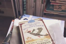 Still life with woodpecker is a sort of a love story that takes place inside a pack of camel cigarettes. Shelf Traveler Review Still Life With Woodpecker By Tom Robbins