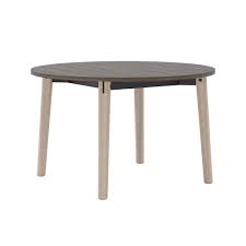 I want a round coffee table in front of the leather loveseat. Juni Meeting Table Third Ward Furniture