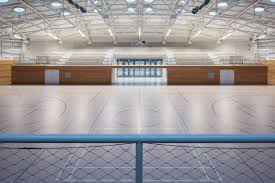 The Sports Hall Designed By Local Architecture Office Sporadical Adjoins A Recently Modernised And Extended Primary Sc Sport Hall Aluminum Shingles Hall Design