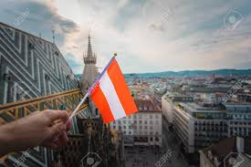 213,461 australia city premium high res photos. Man Holds Austria Flag In Hand Against Vienna City Panorama Background Stock Photo Picture And Royalty Free Image Image 140686563