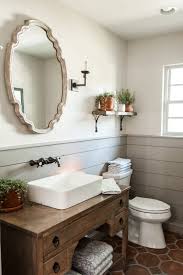The architectural details of this beautiful waterfront home was kept while small changes made it feel more current without losing its integrity. Remodelaholic Get This Look Fixer Upper Hot Sauce House Powder Room