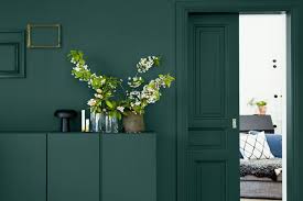 Dark green works so well in an earthy color scheme like this one. Dark Green The Interior Trend You Need Right Now How To Style It Homewings Magazine