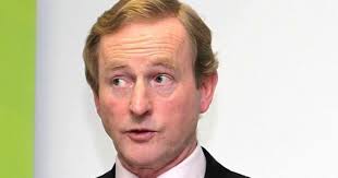 Kenny clings to leadership as front bench rebel