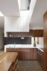 You might be surprised to hear it, but i'm a huge fan of wood cabinets (especially oak). Ask Maria About Kitchen Cabinet Uppers And Lowers In Different Colours