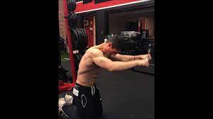 Bent over rows with band view Athlean X Straight Arm Pulldown Reloaded Facebook