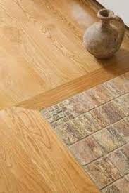 Transitions From Tile To A Wood Floor In A Doorway House Flooring Ceramic Floor Tiles Flooring